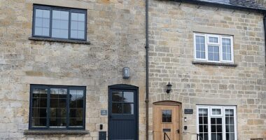 Pictured: One of the houses that has been installed with a black front door and black windows. The changes have not sat well with some residents who feel it is not in character with the area