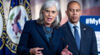 Rep. Katherine Clark, D-Mass., the House minority whip, is joined at right by House Minority Leader Hakeem Jeffries, D-N.Y., during a news conference on day 22 of the government shutdown to discuss the how the crisis can impact health care, at the Capitol in Washington, Wednesday, Oct. 22, 2025.