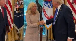 President Donald Trump (right) was seen in video footage Friday posted by longtime aide Margo Martin at the conclusion of a swearing-in ceremony for U.S.'s ambassador to Sweden, Christine Toretti (center). He's held no public events since Tuesday