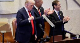 US President Donald Trump arrives to address the Knesset, with Amir Ohana, Speaker of the Israeli Knesset, and Israeli President Isaac Herzog on October 13, 2025, in Jerusalem
