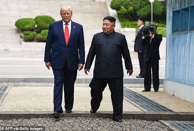 President Donald Trump and North Korean leader Kim Jong-un in the DMZ in 2019. Trump mentioned how Kim was a 'little cloud' hovering over South Korea that he will help fix