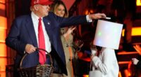 Trump puts candy on kid’s costumed head at White House Halloween event - again