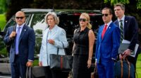From left: Aide Walt Nauta, White House Chief of Staff Susie Wiles, White House press secretary Karoline Leavitt, Assistant to the President Sergio Gor, and an aide, wait for US President Donald Trump to board Marine One on the South Lawn before joining him on May 1