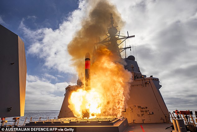The Kremlin reacted furiously to reports that Donald Trump was considering deploying Tomahawk missiles requested by President Zelensky, raising fears of further escalation.  Pictured: The HMAS Brisbane firing a Tomahawk Weapon System off the west coast of the US