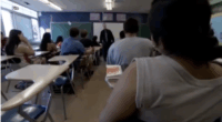 Wisconsin high school students and their teacher in the classroom.