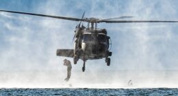 Soldiers jump from a helicopter during a practice operation in the US Virgin Islands as tensions rise between the US and Venezuela