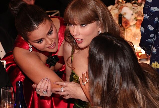 As rumours of bad blood have grown, social media sleuths are all asking the same thing - who is the mole? Selena Gomez and Taylor Swift pictured at the Golden Globes in 2024