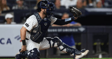 New York Yankees catcher Austin Wells reacts after losing playing time to Ben Rice, while Paul Goldschmidt keeps a firm hold on first base.