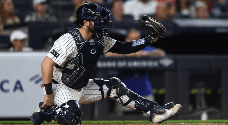 New York Yankees catcher Austin Wells reacts after losing playing time to Ben Rice, while Paul Goldschmidt keeps a firm hold on first base.