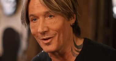 Keith Urban (pictured) is 'in hiding' as he shakes off the 'embarrassment' of his split with wife Nicole Kidman, according to a report