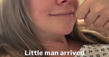 Liz McClarnon has welcomed her first child with her husband Peter Cho after years of 'painful IVF', sharing a thumbs up selfie from hospital on Sunday