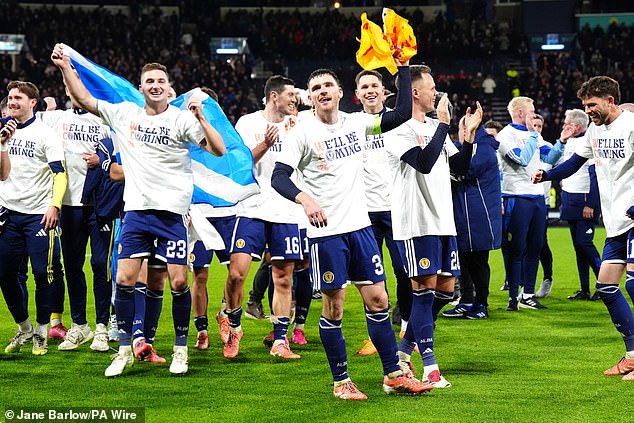Scotland's players celebrate in the wake of their dramatic 4-2 win over Denmark