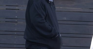 US-born rapper Jelly Roll has taken to social media claiming he was 'treated like a criminal' after entering an upscale fashion house in Sydney. Pictured in Sydney on Wednesday