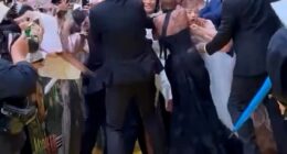 Ariana Grande was ambushed by an overzealous fan while walking the red carpet at the Singapore premiere of her new film Wicked: For Good on Thursday