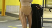 Kanye West's Australian wife Bianca Censori, 30, was spotted at Melbourne Airport on Monday after jetting in from Los Angeles - just in time for the Melbourne Cup on Tuesday