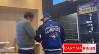 The incident appeared to begin with the man in the Blue Jays jacket elbowing the other man