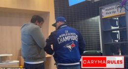 The incident appeared to begin with the man in the Blue Jays jacket elbowing the other man