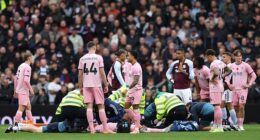 Bournemouth players stand around after seeing Tyler Adams and Adam Smith clash heads