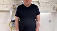 Graham Linehan (above) posted online this photo taken in A&E after he was tested for high blood pressure following his arrest in September 2025 at Heathrow airport