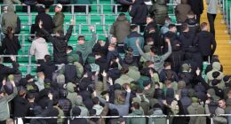 Celtic supporters boo during minute's silence on Remembrance Day as referee ends tribute after just 10 SECONDS