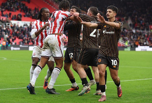 Stoke and Hull players clashed at full-time after the latter claimed a last gasp 2-1 victory