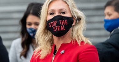 Marjorie Taylor Greene appeared to send a coded message renouncing QAnon in her shock resignation statement