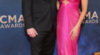 Time for bed or the CMA awards? Viral influencers Campbell 'Pookie' Puckett and her husband Jett arrived to the red carpet, but Campbell's hot pink, silk dress looked a bit more like a nightgown than a dress for a formal event. Jett was also a bit dressed-down in a casual, all-black suit and leather boots