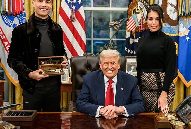 Cristiano Ronaldo and fiancee Georgina Rodriguez pose with Donald Trump in the Oval Office