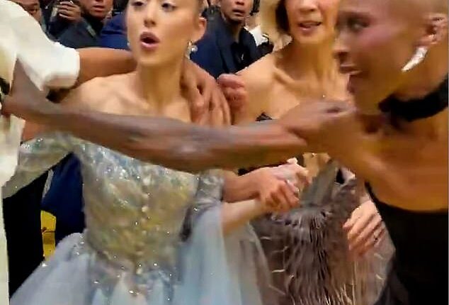 Cynthia Erivo 's lightening quick reactions have earned her a new legion of fans after she rescued close friend and Wicked co-star Ariana Grande from an over excited fan on Thursday