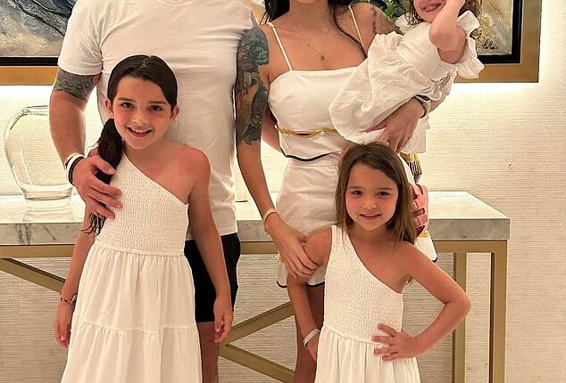 Chris Scholtes (left) killed himself at his family home in Phoenix on November 5. Scholtes's wife Dr Erika Scholtes is seen holding daughter Parker, 2, who died in a hot car in July 2024