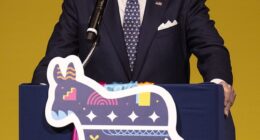 In a fiery return to the political stage, Joe Biden tore into Donald Trump on Friday night, accusing his successor of defacing 'the People's House' with a $300 million vanity project thundering, 'Who in the hell does he think he is?'