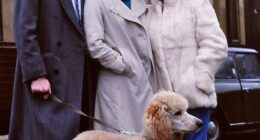Original EastEnders characters Den Watts (played by Leslie Grantham), Angie Watts (Anita Dobson) and daughter Sharon (played by Letitia Dean) with Roly the dog outside the Queen Vic