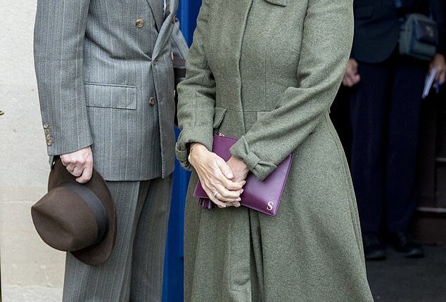 Sophie, Duchess of Edinburgh and Prince Edward, Duke of Edinburgh, pose for photographs after reopening the Royal Box at Newbury Racecourse
