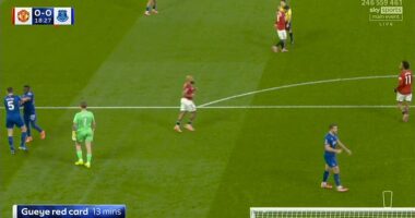 Everton star is sent off against Man United after SLAPPING his own teammate in moment of madness - but Gary Neville insists midfielder should not have seen red despite 'unsavoury' clash