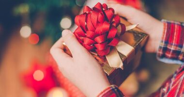 A mom has sparked a fierce debate after she revealed she wasn't buying anything new for her kids for Christmas this year in a bid to 'lower her contribution to consumerism' (stock image)