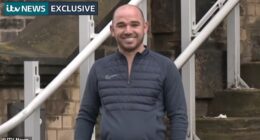 Fraudster William 'Billy' Smith, 35, smiled to cameras as he handed himself back into HMP Wandsworth