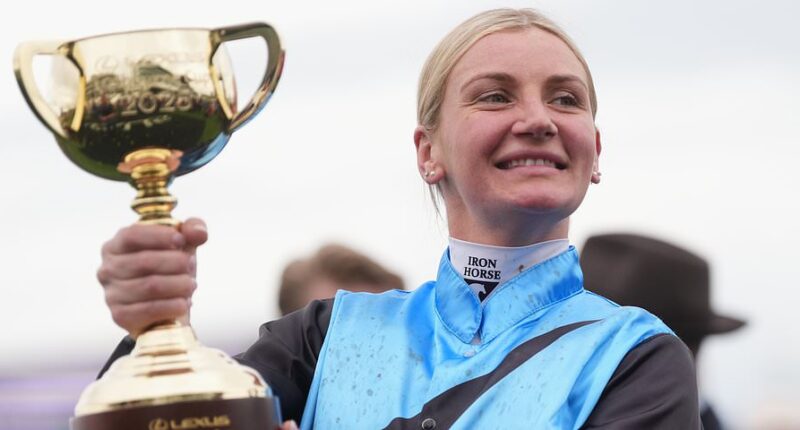 Half Yours claims stunning victory in the Melbourne Cup after chasing down huge frontrunner - as jockey Jamie Melham's astonishing feat makes sporting history