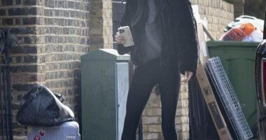 Holly Ramsay clutched a 'Bride' phone case as she broke cover on Thursday morning for the first time since her feud with fiancé Adam Peaty 's family came to light