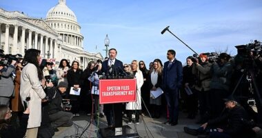 U.S. Representative Thomas Massie (R-KY), accompanied by U.S. Representatives Marjorie Taylor Greene (R-GA) and Ro Khanna (D-CA), speaks during a press conference on the Epstein Files Transparency Act ahead of a House vote on the release of files related to the late convicted sex offender Jeffrey Epstein, on Capitol Hill in Washington, D.C., U.S., November 18, 2025