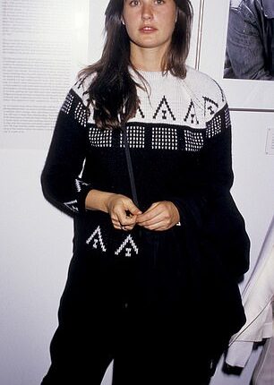 AI photos have imagined what Demi Moore would look like if she had not had any suspected cosmetic enhancements. She's seen in 1987