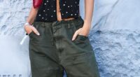 Model Emily Ratajkowski is pictured wearing oversized khaki cargo trousers in Paris in 2024 for a Vans event