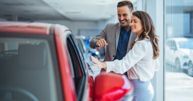 Owning a new car is still seen as a powerful status symbol for many Australians, but a recent Finder study found that it isn't an indicator of financial status