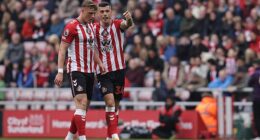 Sunderland centre back Dan Ballard (left) has hailed the impact of fellow former Gunner Granit Xhaka (right) at the Stadium of Light