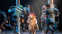 Just a few minutes into the world premiere of Paddington The Musical, the actors, who were crowded across a set designed to look like a busy railway station, stepped aside to reveal a small, furry figure in their midst, writes Jan Moir