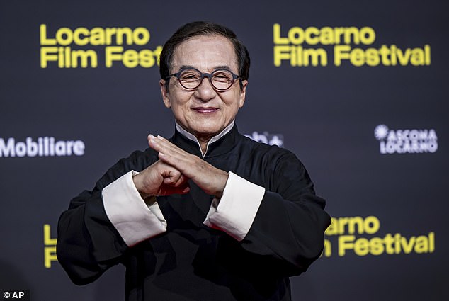 Jackie Chan is alive and well - amid a death hoax circulating about him online. Pictured in August at the Locarno International Film Festival, in Locarno, Switzerland