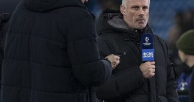 Jamie Carragher was stopped from joining Borussia Dortmund fans in the away end during their Champions League clash against Manchester City