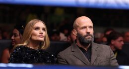 Jason Statham, Rosie Huntington-Whiteley (seen) and Pierce Brosnan brought a touch of glamour to Tottenham Hotspur Stadium on Saturday night, as they led the famous faces turning out to watch Conor Benn vs Chris Eubank Jr