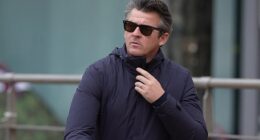 Joey Barton is pictured arriving at Liverpool Crown Court on Monday morning