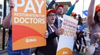 Striking doctors on the picket line earlier this year