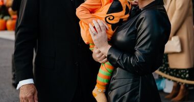 Karoline Leavitt, 28, appeared to hide her husband's face in new Instagram posts this weekend as she was accused of 'airbrushing' his visage on Halloween